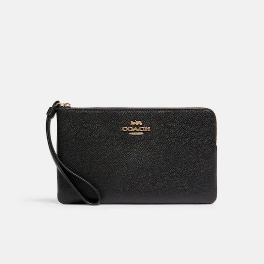 ❌SOLDE❌Coach wristlet ✨ NEW